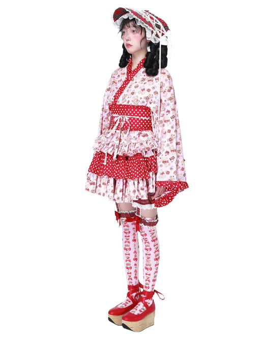 Person wearing a red and white polka dot outfit with matching shoes on a white background