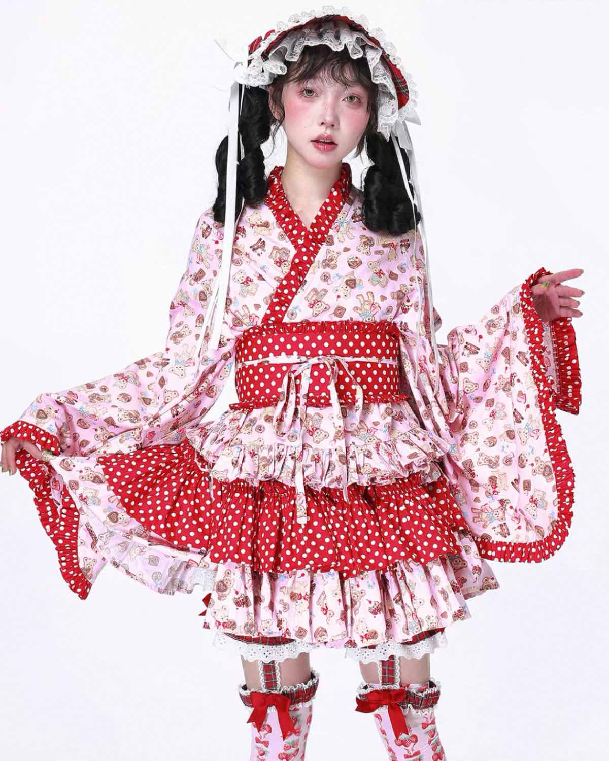 Person wearing a red and white polka dot dress with floral patterns on a white background
