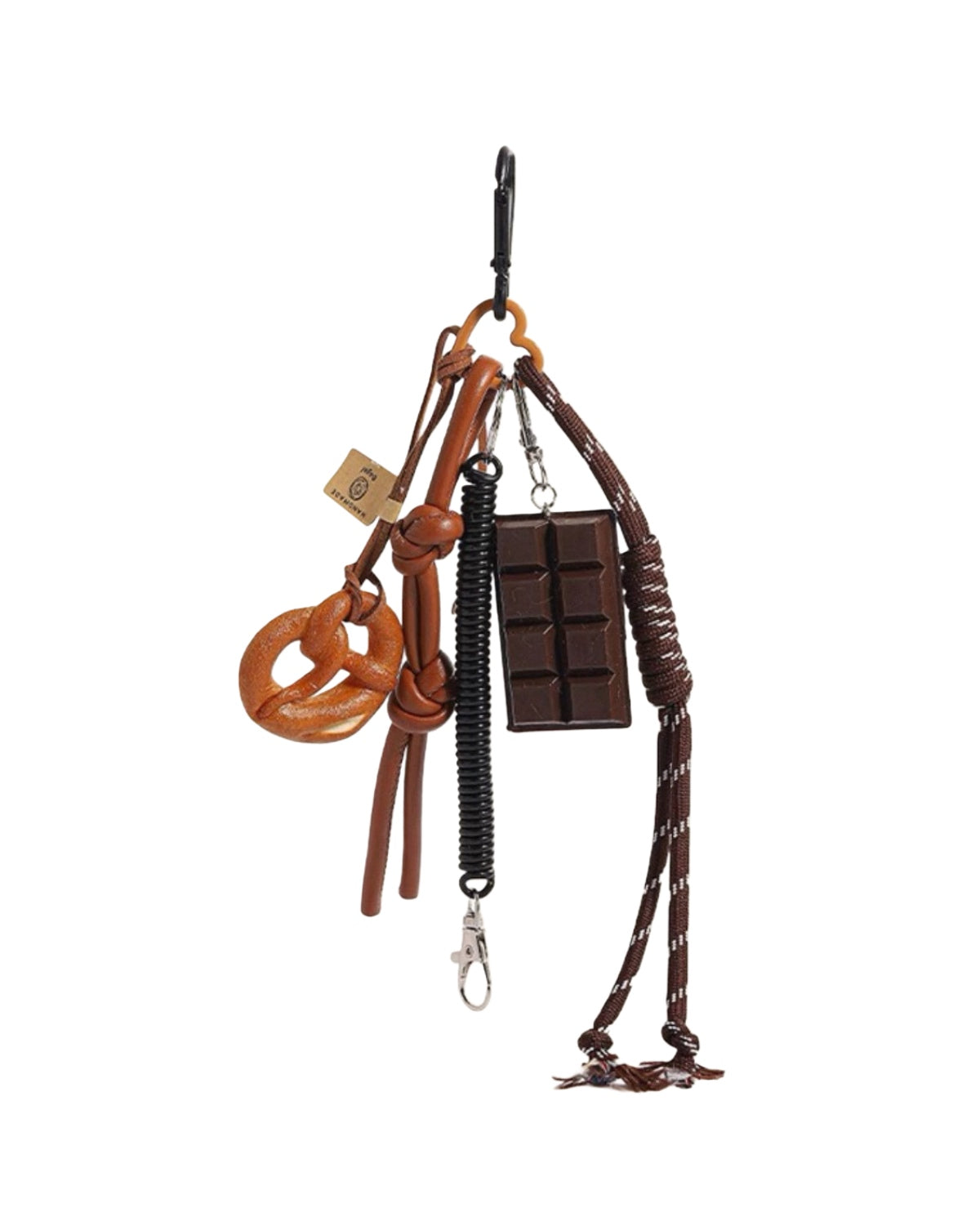 Brown leather bridle with a chocolate bar and pretzel on a white background