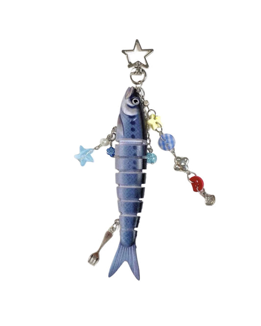 Decorative keychain shaped like a fish with colorful beads on a white background