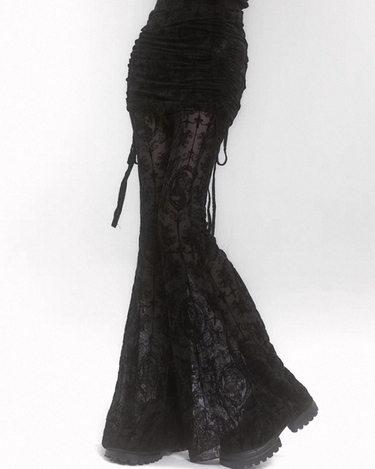Black lace-up pants on a white background