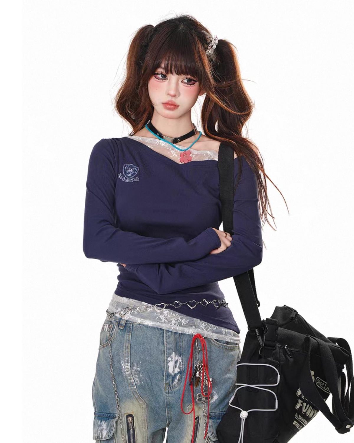 Blue Lace Splice One-Shoulder Top On Model Arms Crossed