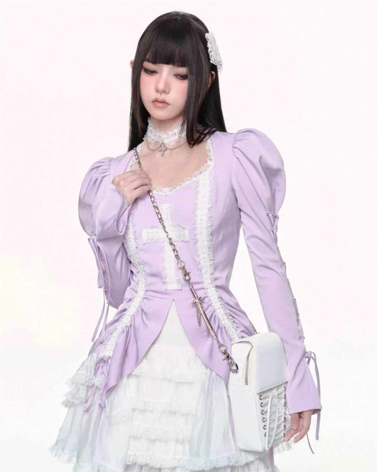 Woman wearing a lavender Lolita-style outfit with a white handbag on a white background
