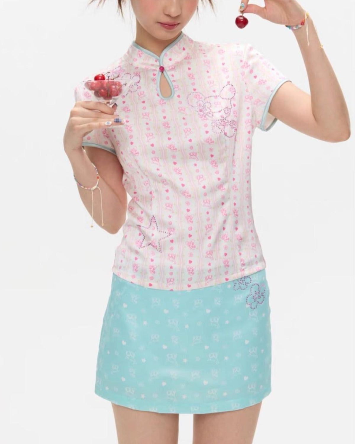 Mint Green Chinese-Style Outfit Set Closer Up On Model With Cherries