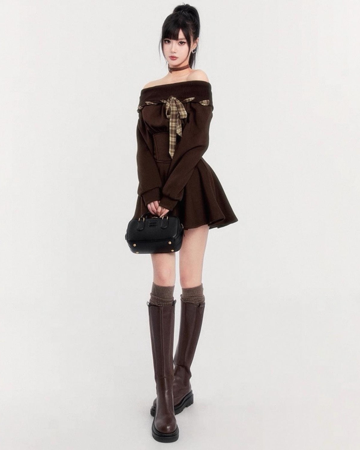 Off-Shoulder Mini Dress On Model With Bag