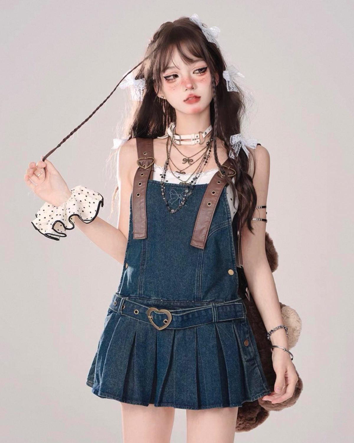 Pleated Denim Dress On Model Playing With Hair