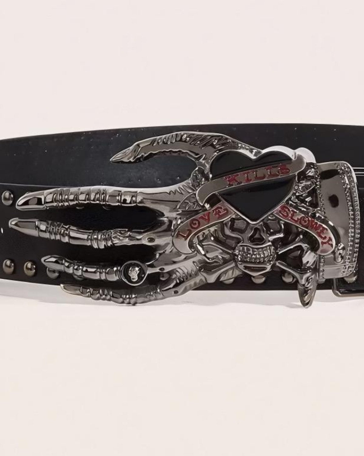 Belt with a skull and crossbones buckle on a white background