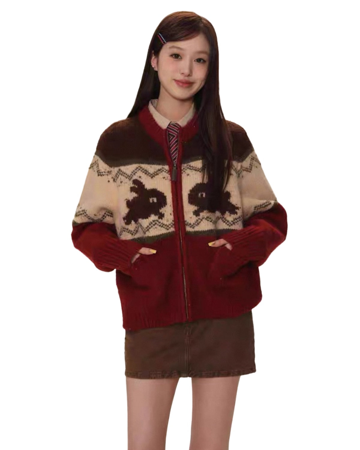 Person wearing a red and brown patterned sweater on a white background