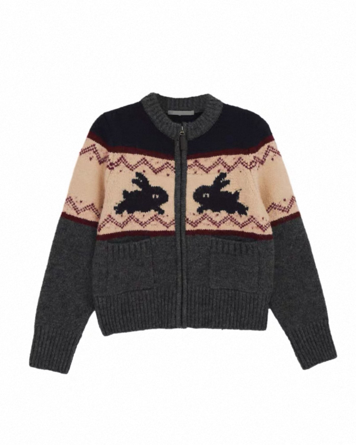 Sweater with bunny rabbit pattern on a white background