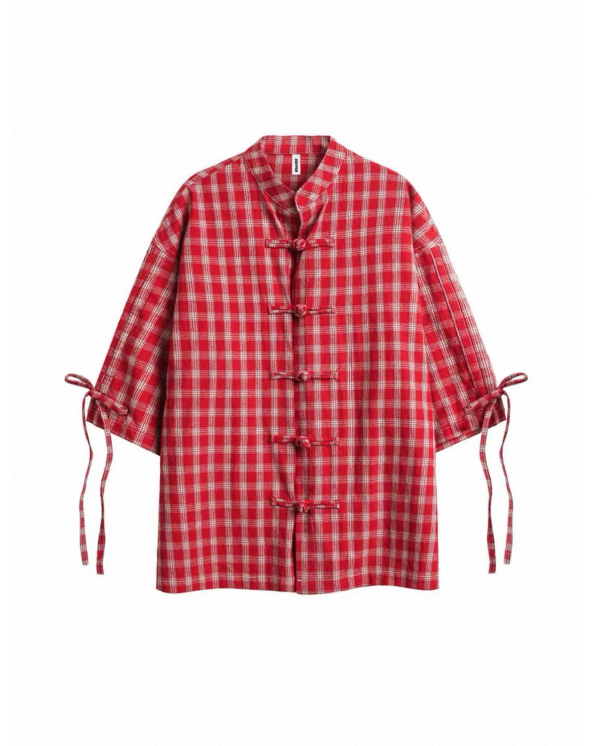 Red and white checkered shirt with tied sleeves on a white background