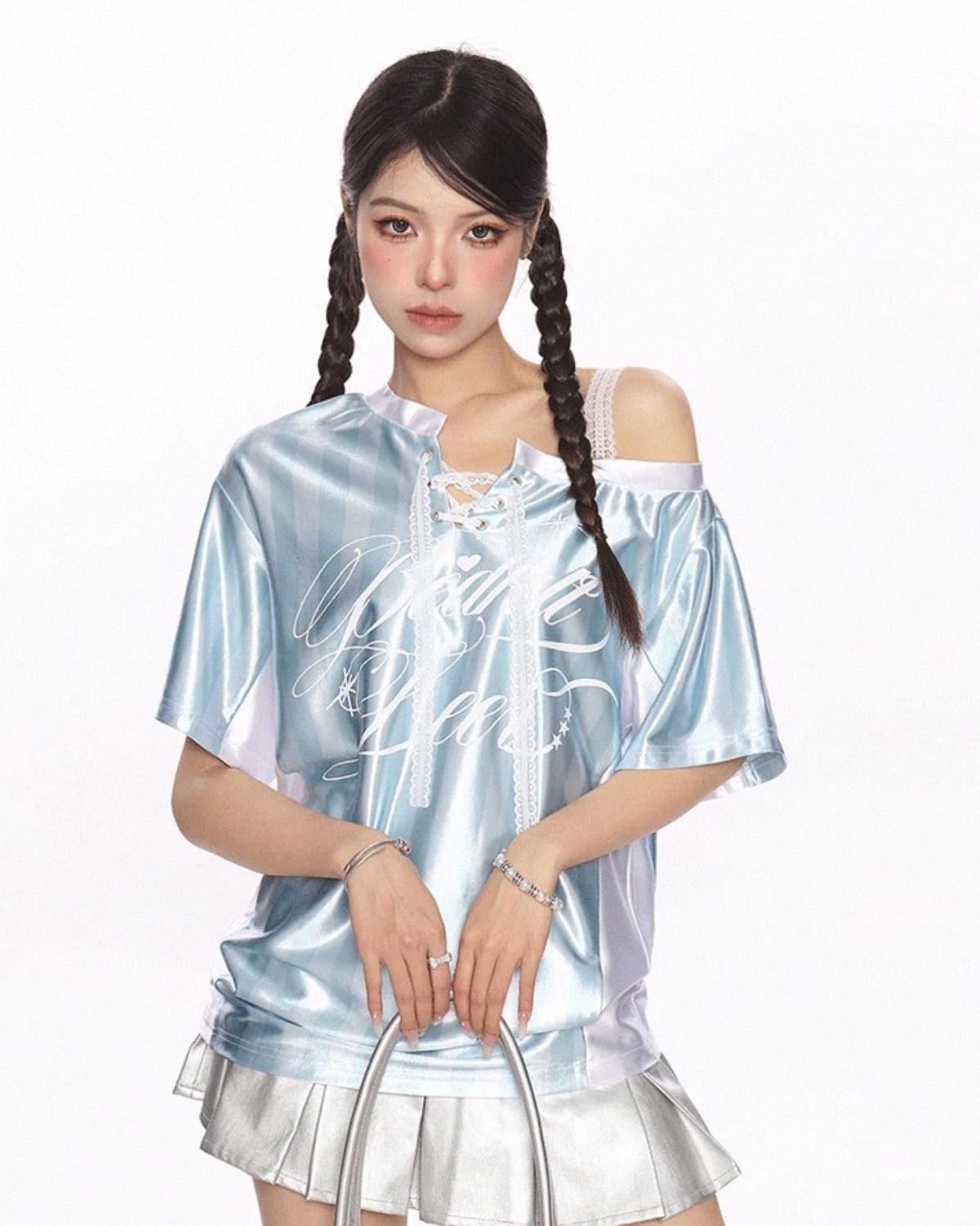 Off-Shoulder Retro T-Shirt Closer Up On Model with Silver Bag